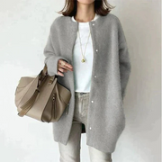 Women's long cardigan with a round neckline, a button front and a longline silhouette