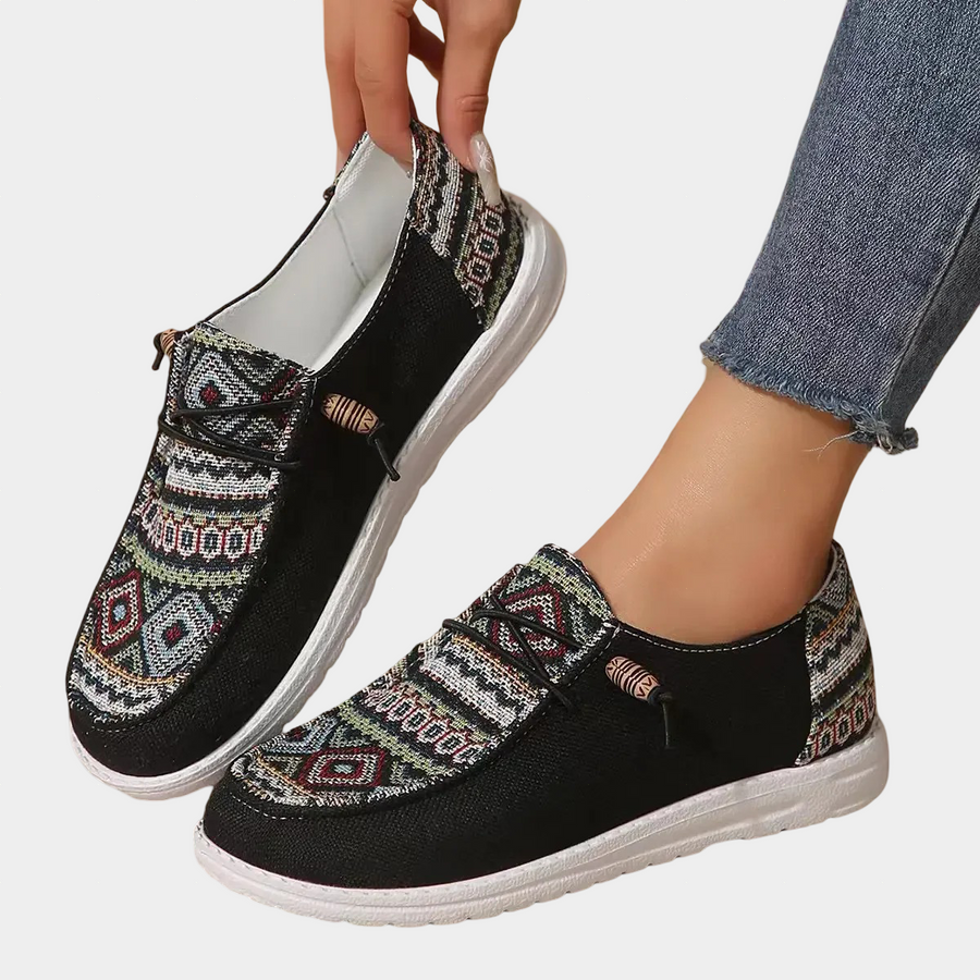Women's loafers with a geometric pattern, a slip-on design and a rounded toe