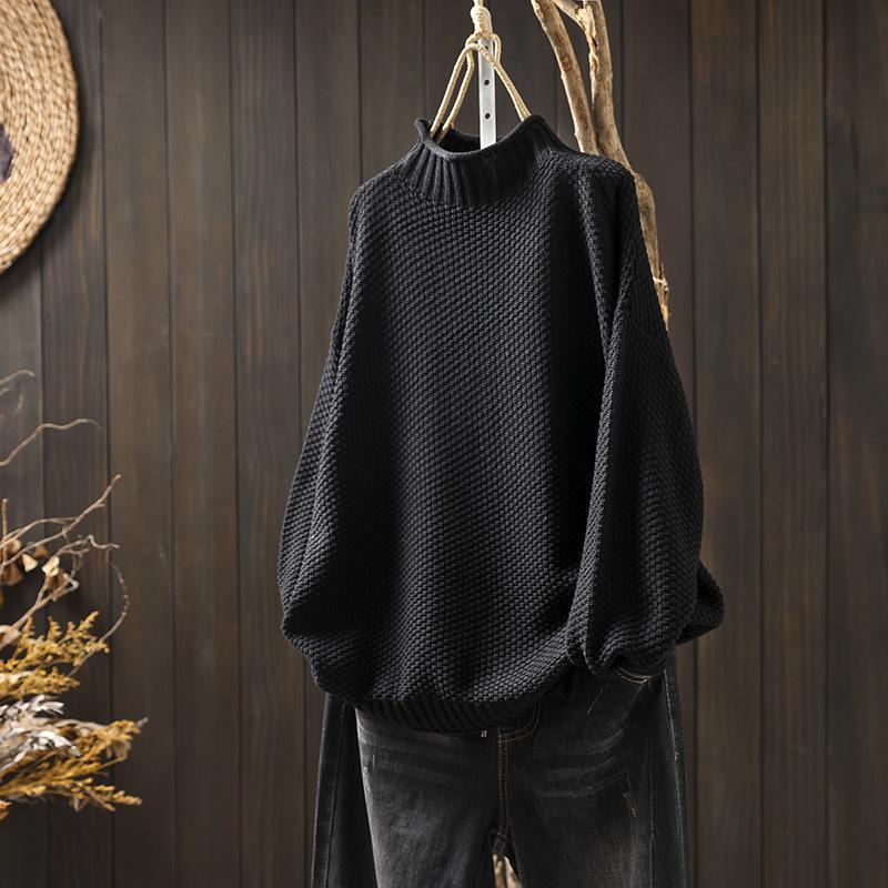 Women's jumper with a stand collar, a ribbed texture and raglan sleeves