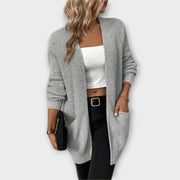 Women's long cardigan with an open front, long sleeves and patch pockets
