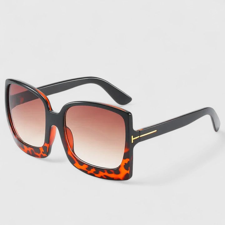 Women's sunglasses with a square frame, an oversized frame and broad temples