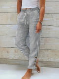 RAQUELLE | STRIPED RELAXED-FIT TROUSERS