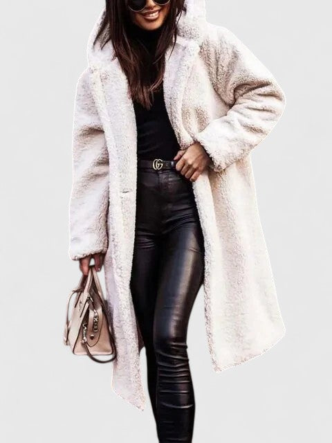 Women's long coat with a textured surface, notched lapels and a longline silhouette