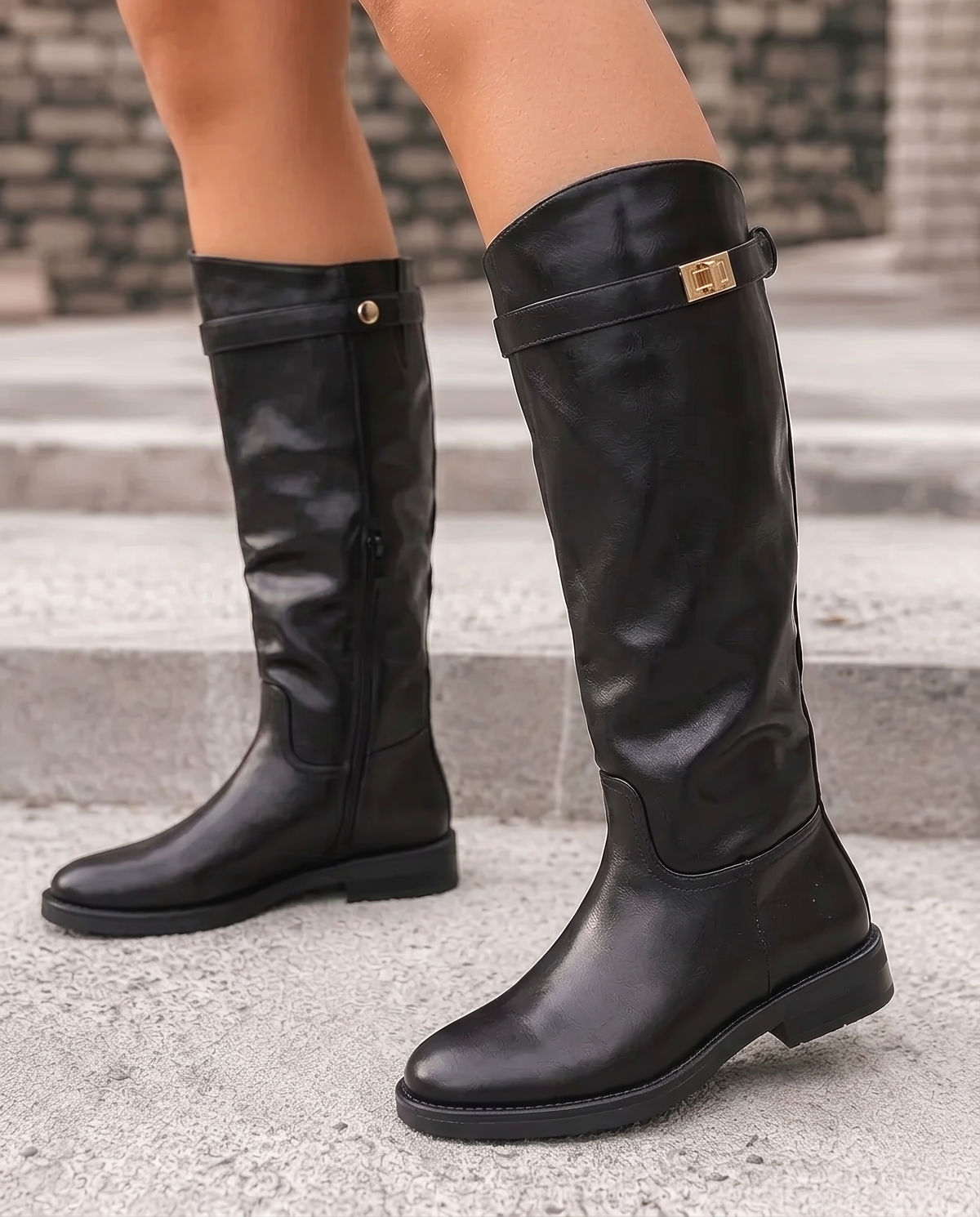 Theresina buckle-detail boots in black