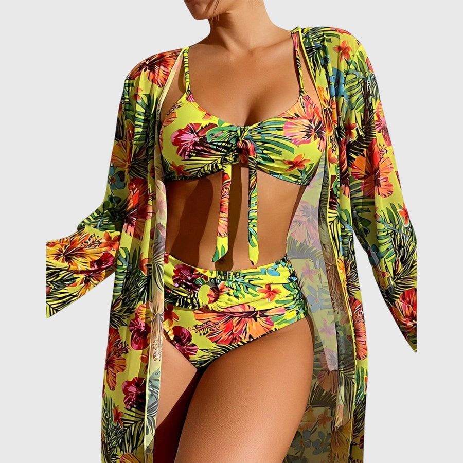 Women's bikini and cover-up set with a tropical print, a tie front and shoulder straps
