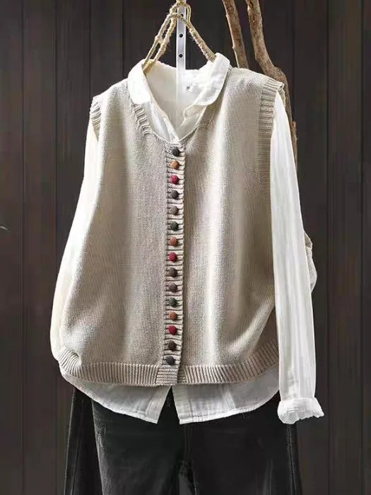 Women's knitted gilet with a button front, a sleeveless shape and a V-shaped neckline
