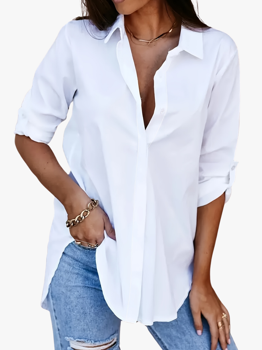 Women's shirt with a pointed collar, a button front and turned-up sleeves