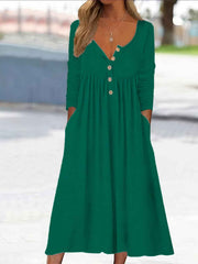 Women's midi dress with a button neckline, a V-shaped neckline and elbow-length sleeves