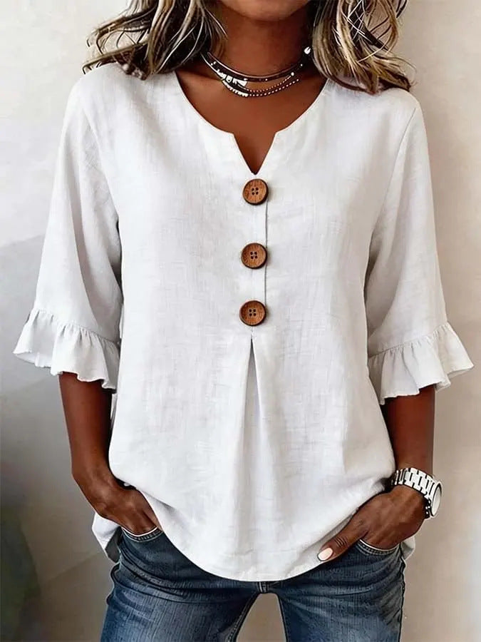 Women's blouse with a button neckline, a notched neckline and ruffled sleeves