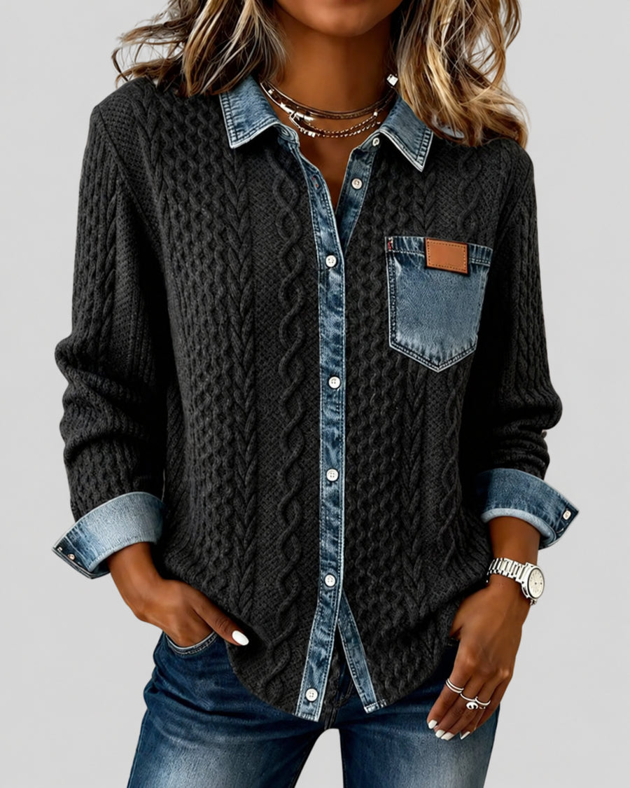 Cable-knit cardigan with denim-effect collar, button placket and chest pocket, front view.