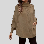 Cable-Knit Roll-Neck Poncho, front view.