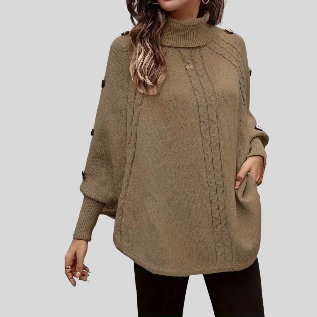 Cable-Knit Roll-Neck Poncho, front view.