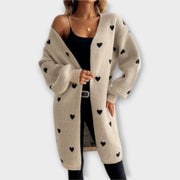 Women's long cardigan with a button front, a longline silhouette and long sleeves