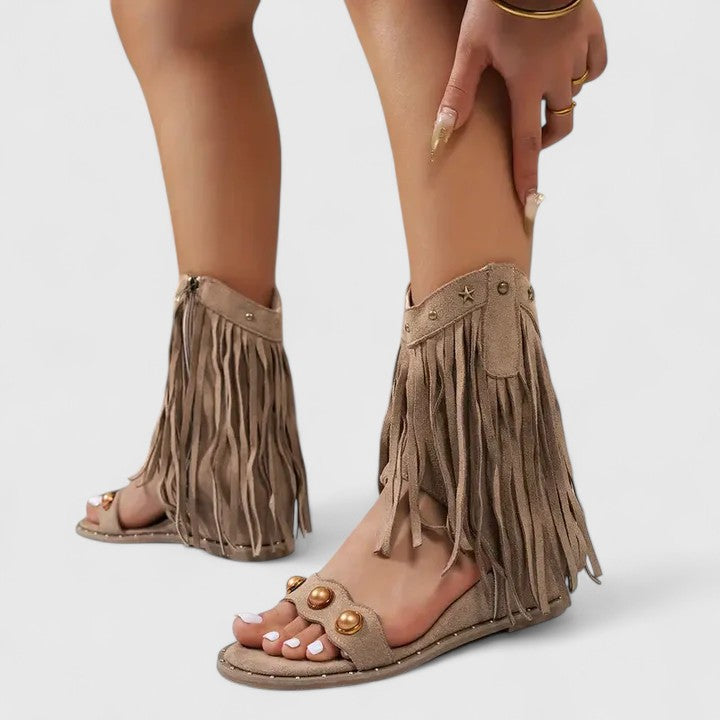 Women's sandals with fringe detailing, a zipped shaft and decorative embellishment