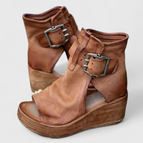 Women's wedge sandals with cut-out detailing, buckle details and an open toe
