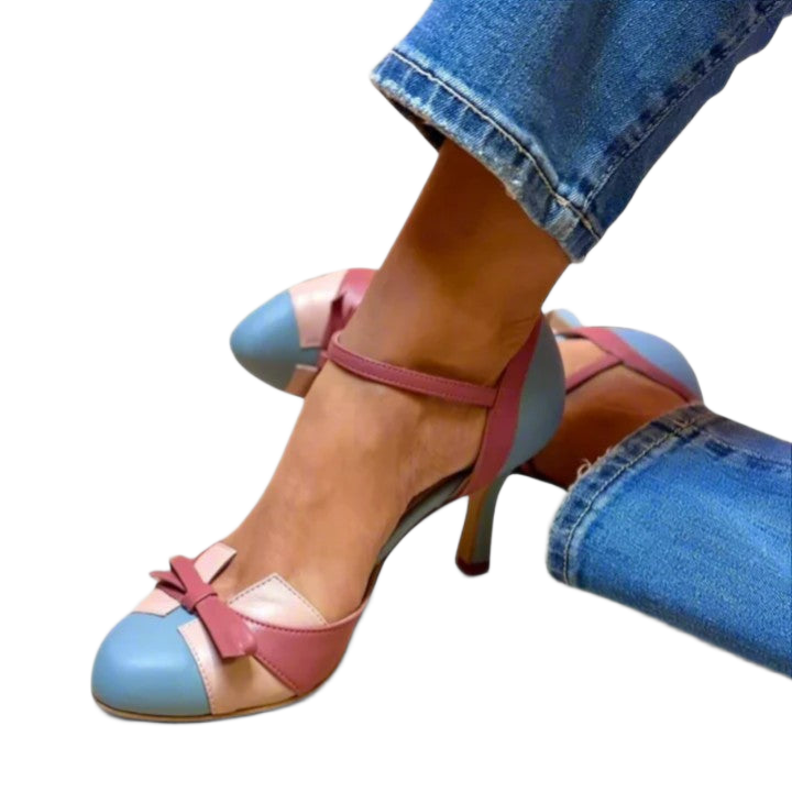 Women's heels with a bow detail, colour-block panels and an ankle strap
