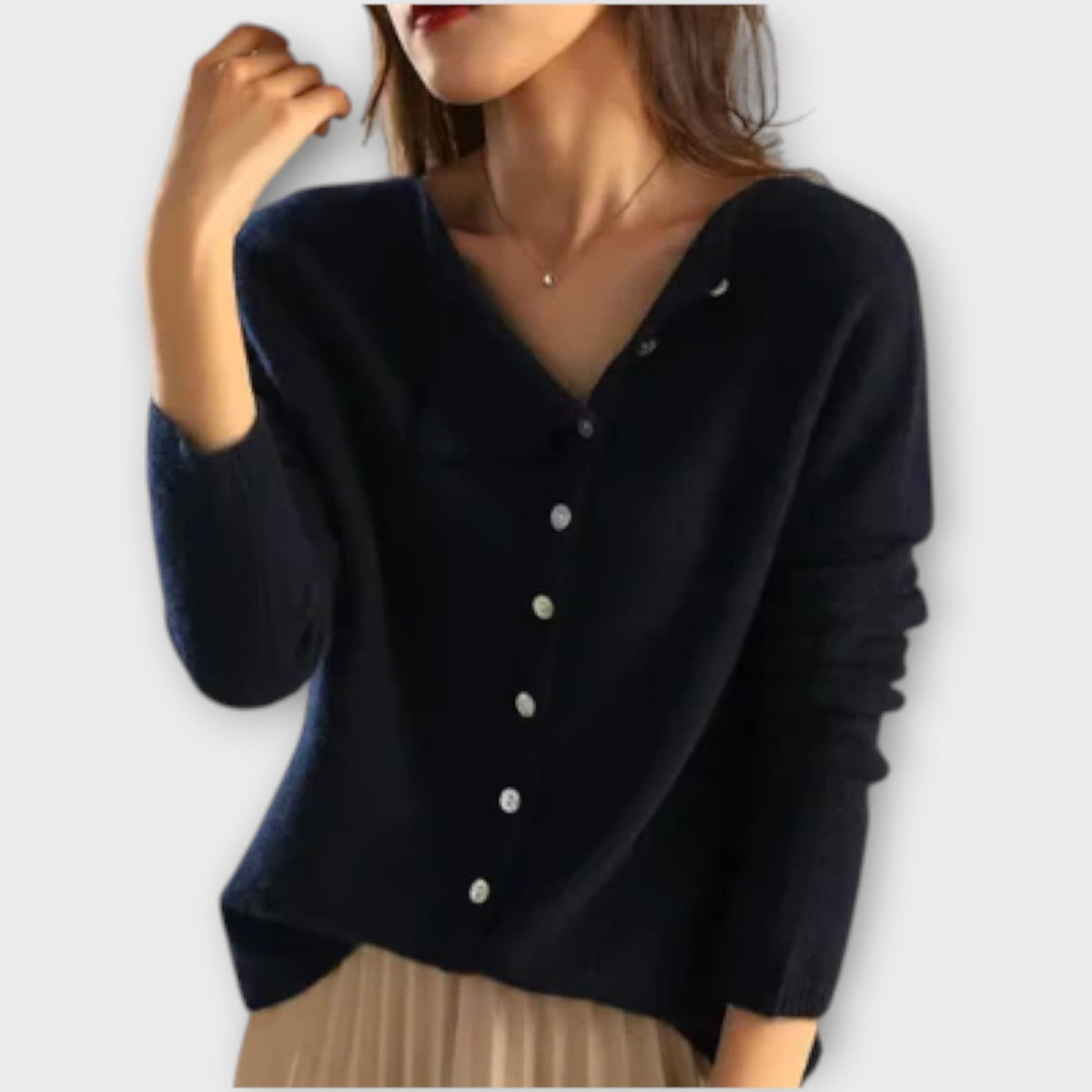 Women's cardigan with a button front, a round neckline and long sleeves
