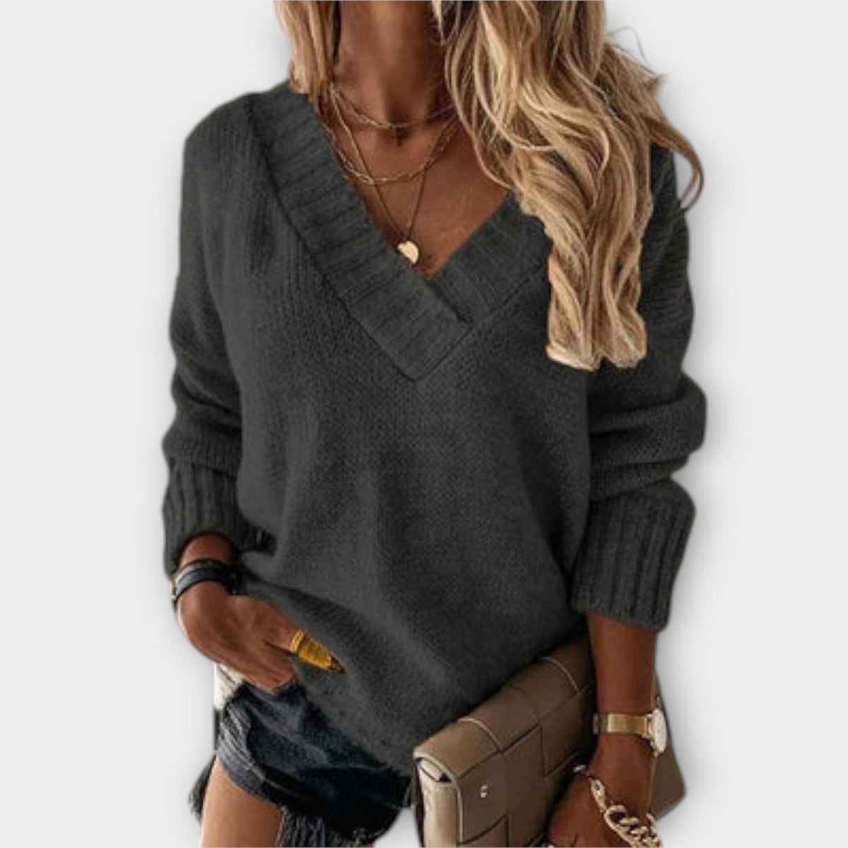 Women's jumper with a V-shaped neckline, long sleeves and ribbed cuffs and hem