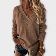 Women's jumper with a V-shaped neckline, long sleeves and ribbed cuffs and hem