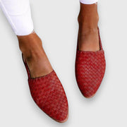 Women's flats with a woven-look texture, a slingback strap and a pointed toe