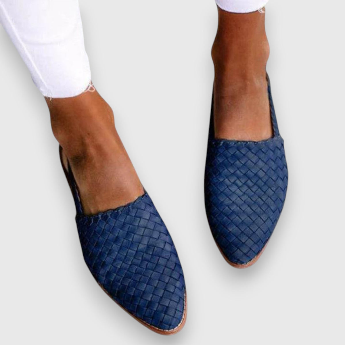 Women's flats with a woven-look texture, a slingback strap and a pointed toe