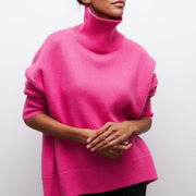 Women's jumper with a roll neckline, elbow-length sleeves and a ribbed hem
