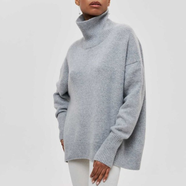 Women's jumper with a roll neckline, elbow-length sleeves and a ribbed hem