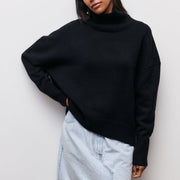 Women's jumper with a roll neckline, elbow-length sleeves and a ribbed hem