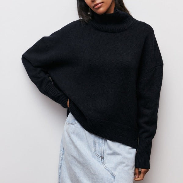 Women's jumper with a roll neckline, elbow-length sleeves and a ribbed hem