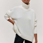 Women's jumper with a roll neckline, elbow-length sleeves and a ribbed hem