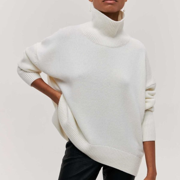 Women's jumper with a roll neckline, elbow-length sleeves and a ribbed hem