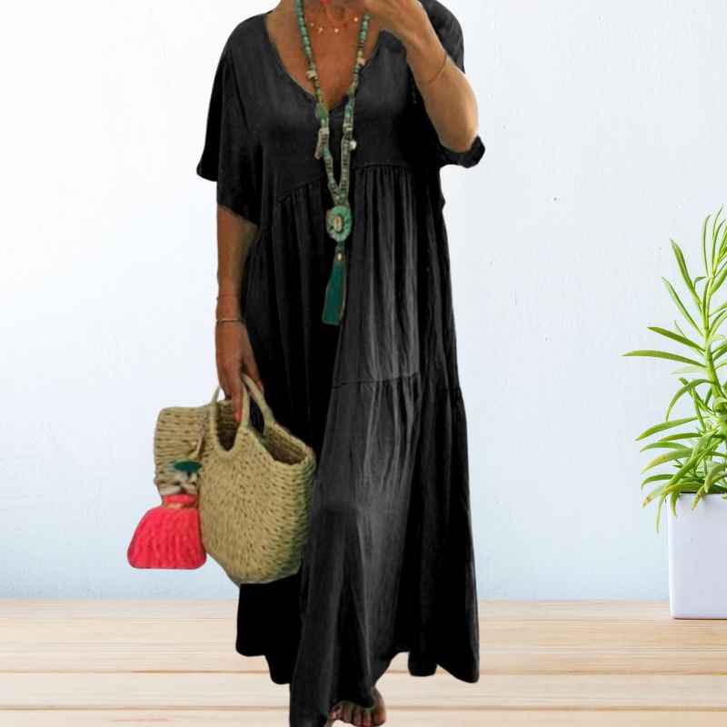Women's maxi dress with a V-shaped neckline, elbow-length sleeves and a tiered skirt