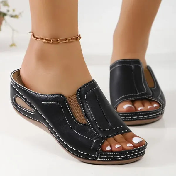 Women's sandals with cut-out detailing, a slip-on design and an open toe