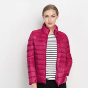 Godiva | Lightweight Waterproof Down Puffer Jacket in Navy