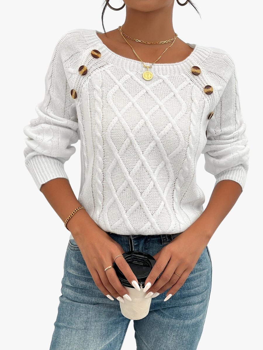 Women's jumper with a raised diamond texture, shoulder buttons and a round neckline