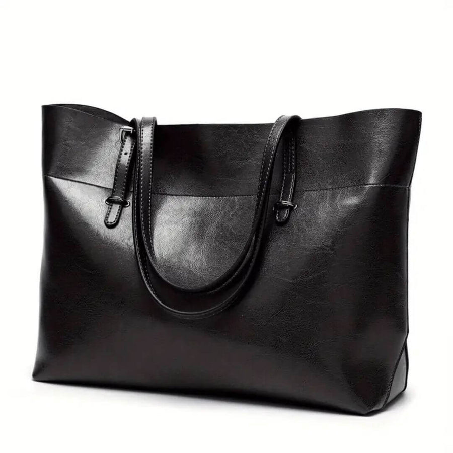 Women's handbag with twin carry handles, a tote silhouette and a rectangular shape