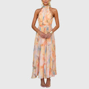 Women's maxi dress with a halterneck design, an abstract print and pleated detailing