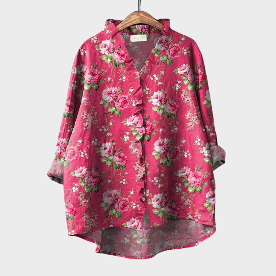 Women's blouse with a floral pattern, a ruffled placket and a V-shaped neckline