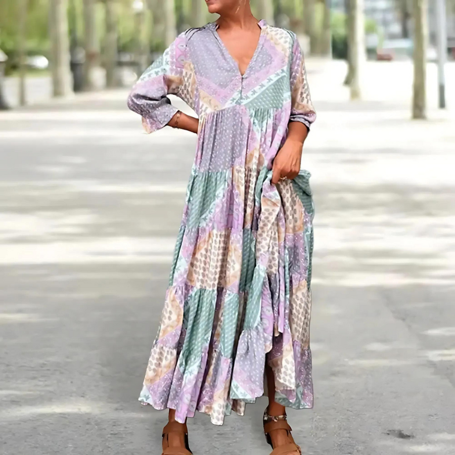 Women's midi dress with a patchwork print, a V-shaped neckline and long sleeves