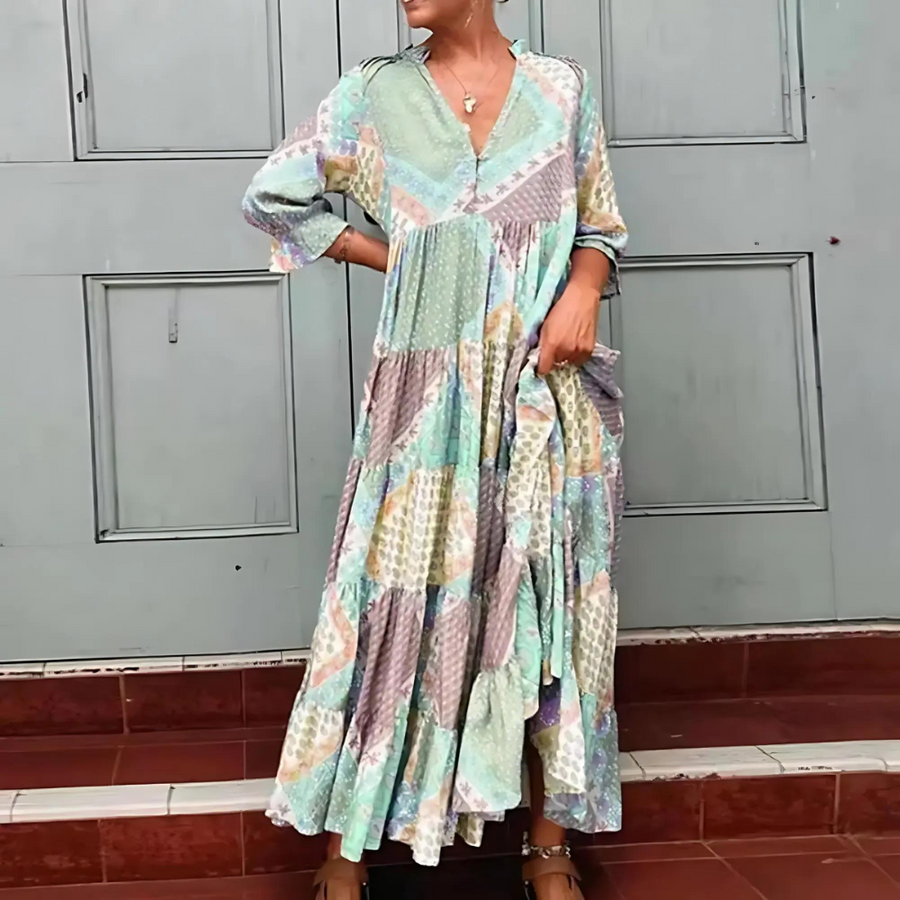Women's midi dress with a V-shaped neckline, long sleeves and a tiered skirt