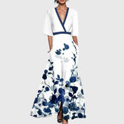Women's maxi dress with a floral pattern, contrasting trim and a V-shaped neckline