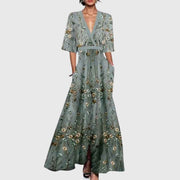 Women's maxi dress with contrasting trim, a V-shaped neckline and side pockets