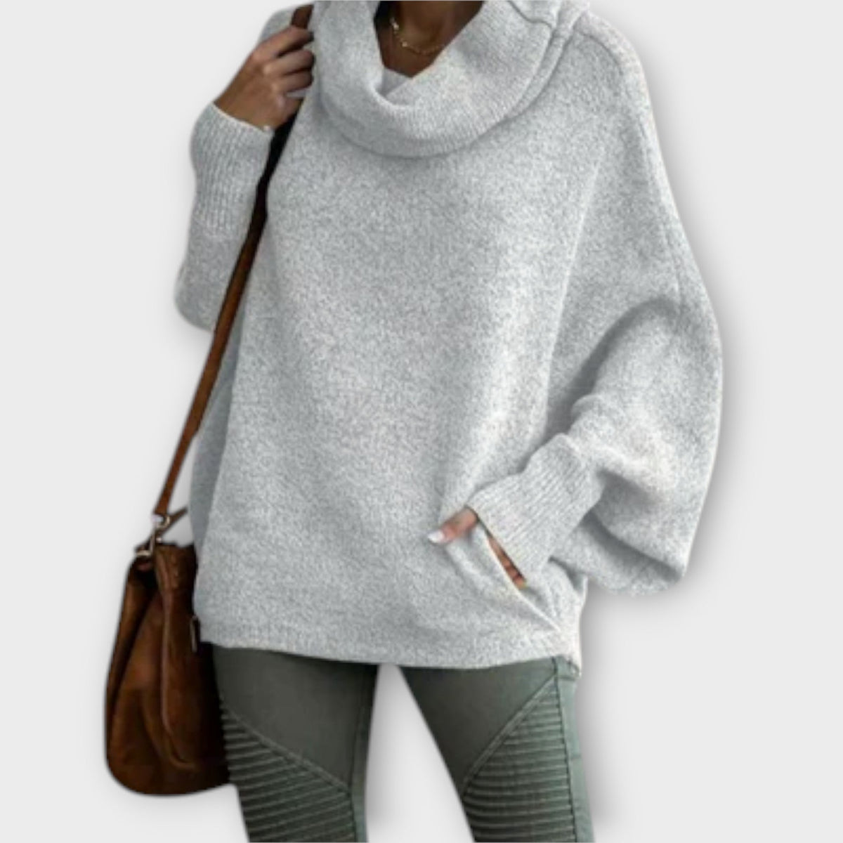 Women's jumper with a roll neckline, long sleeves and dropped shoulders
