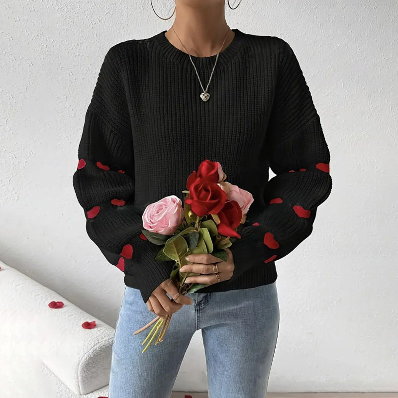 Women's jumper with a ribbed texture, a round neckline and long sleeves