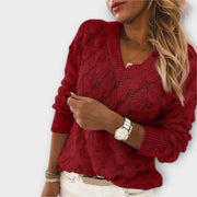 Women's jumper with a shell-like knitted texture, a V-shaped neckline and long sleeves