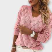 Women's jumper with a shell-like knitted texture, a V-shaped neckline and long sleeves