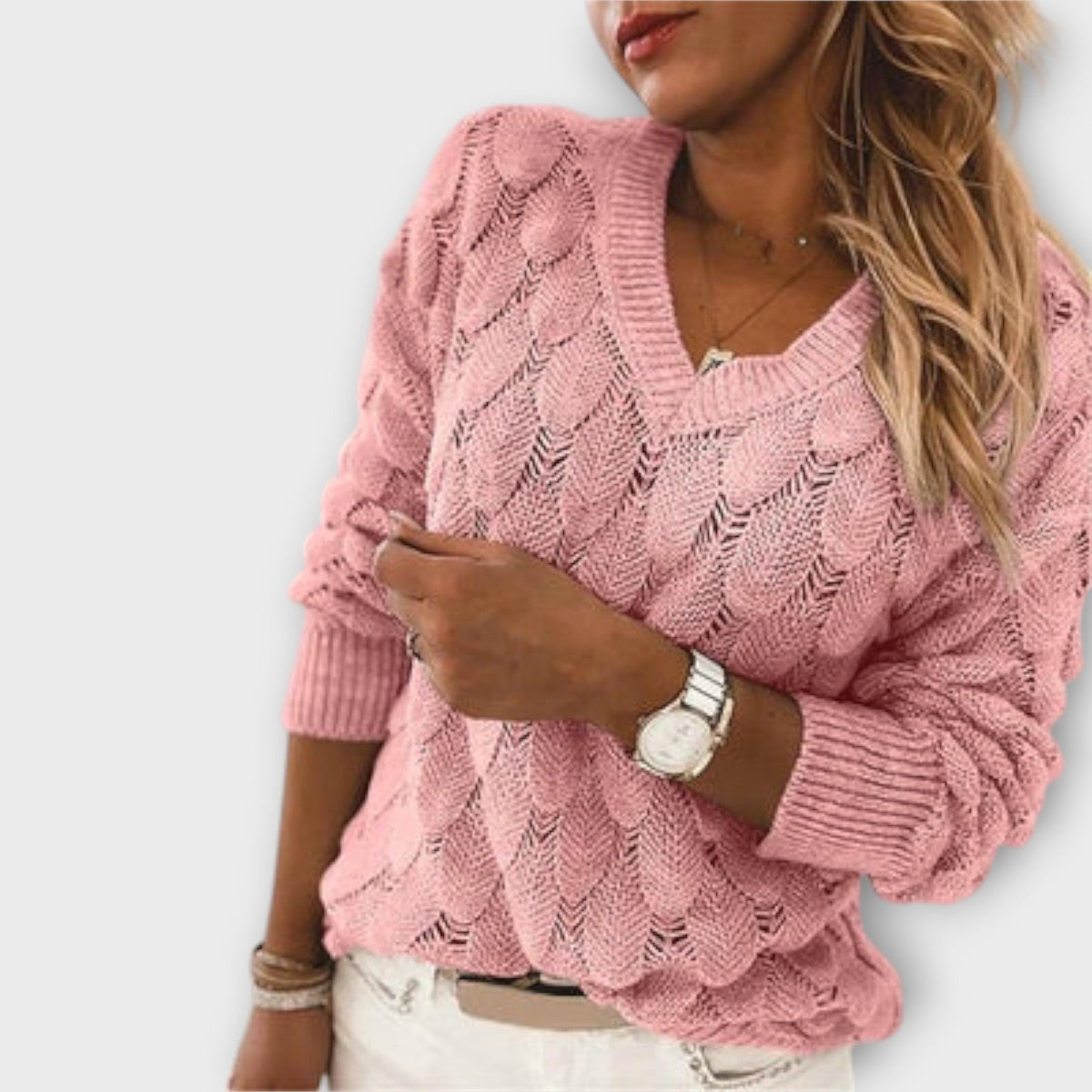 Women's jumper with a shell-like knitted texture, a V-shaped neckline and long sleeves