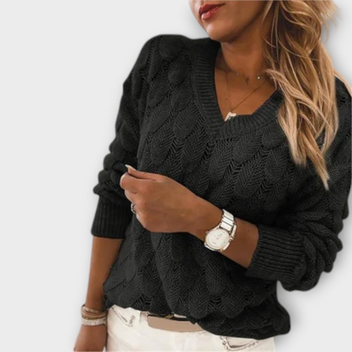 Women's jumper with a shell-like knitted texture, a V-shaped neckline and long sleeves