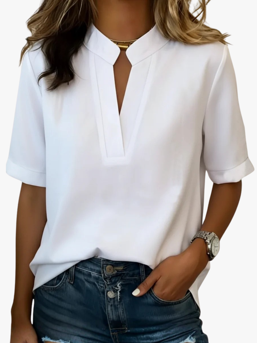Women's blouse with a keyhole opening, a stand collar and elbow-length sleeves