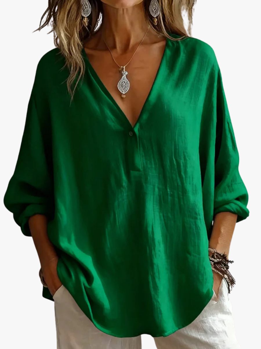 Women's blouse with a notched neckline, a relaxed silhouette and long sleeves